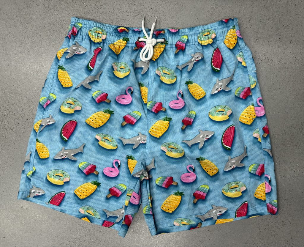 hole fabric swim trunks